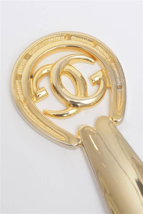 gucci shoe horn gold|Gucci gold Shoe Horn .